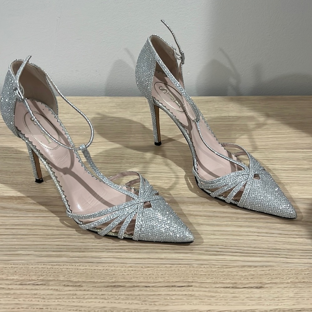 SJP by Sarah Jessica Parker silver heels (“Carrie Pumps”)